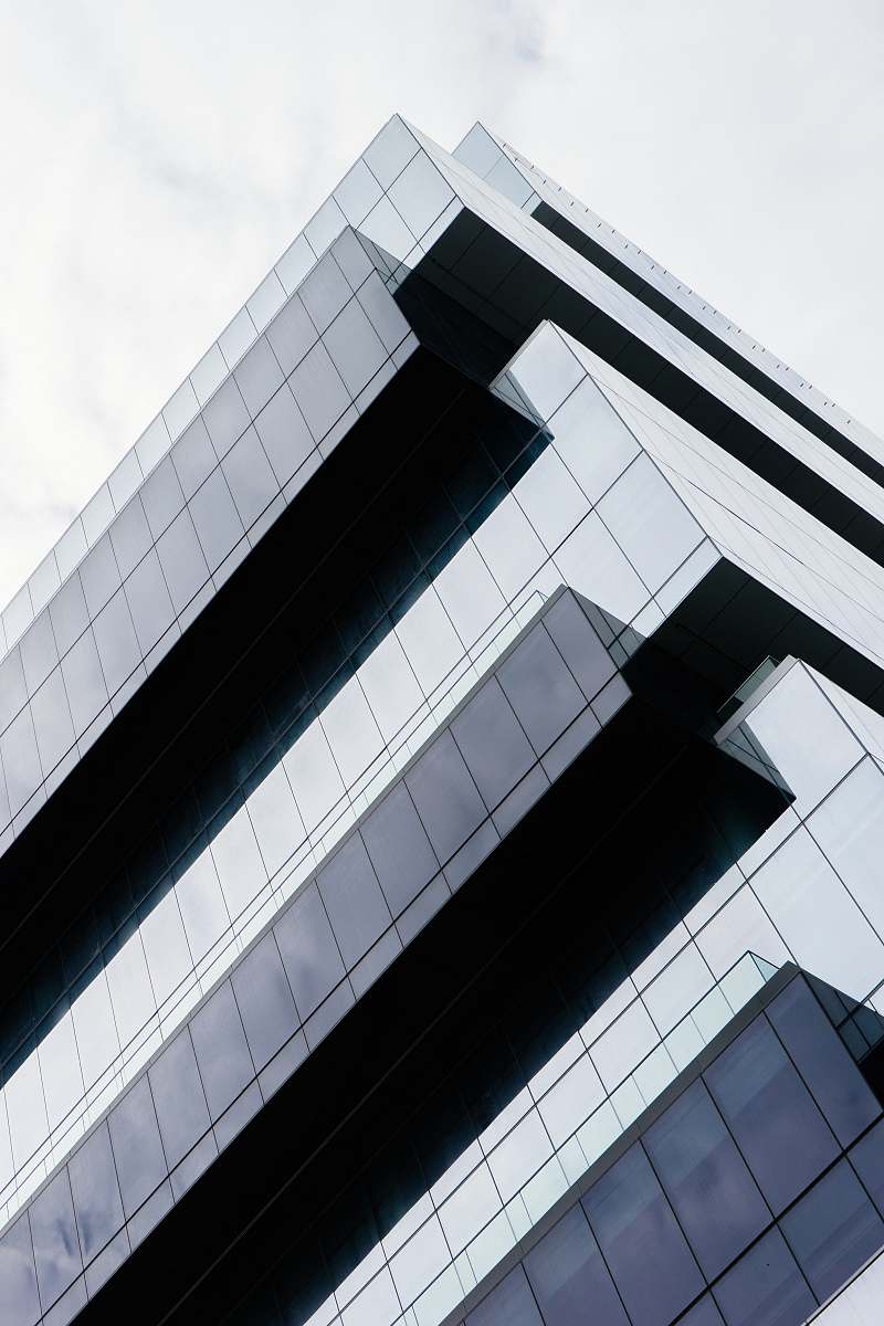 office building low angle photo of buildings architecture